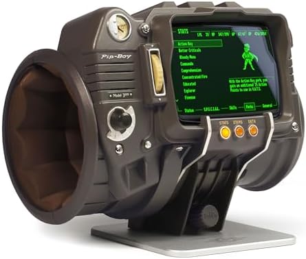 The Wand Company Pip-Boy 3000 Fallout 3 New Vegas Die-Cast Replica FM Radio and Alarm Clock LCD Screen with Memory Foam Cuff and Stand Officially Licensed by Bethesda Amazon.co.uk: Toys & Games